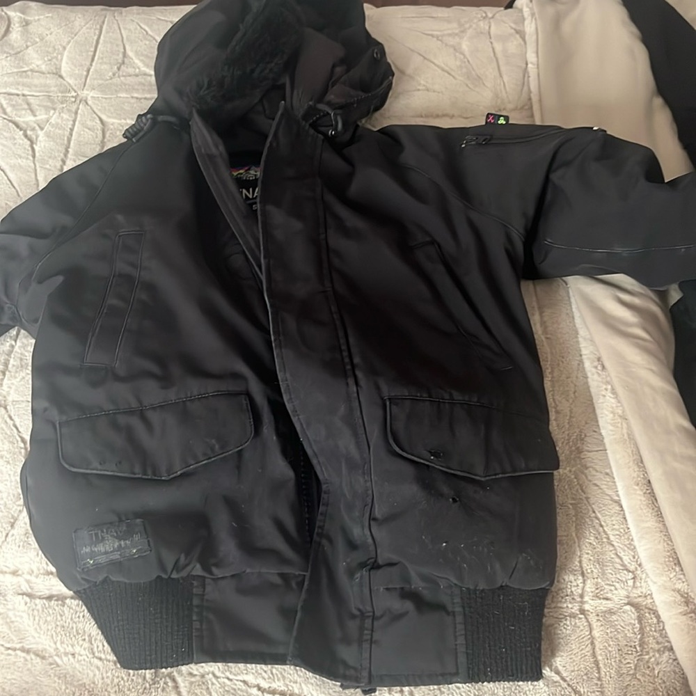 Tna coat